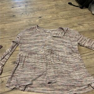 Long sleeve peplum top.